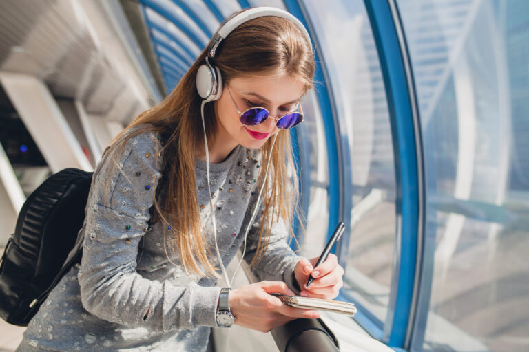 Best Podcasts to Download Before a Long Flight
